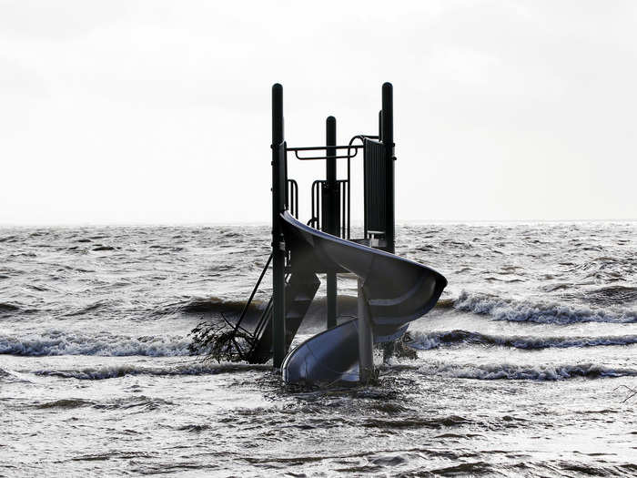 On the south coast of Long Island, some playgrounds were drowned underwater. This one was in Bellport, New York.