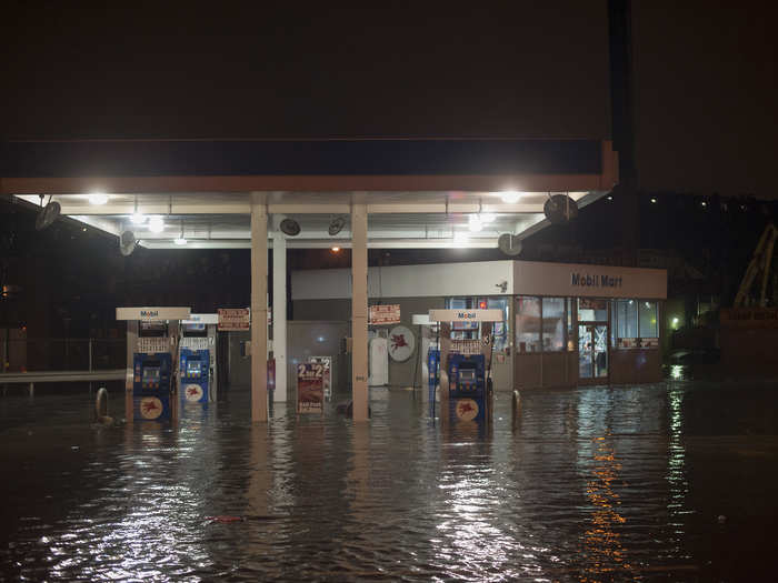 A gas station submerged in floodwaters near the Gowanus Canal in Brooklyn.