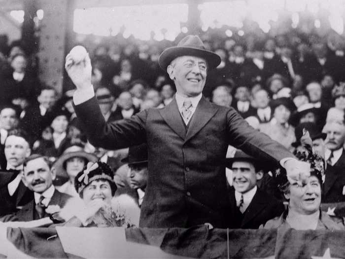 Woodrow Wilson throwing the first pitch at a baseball game in Washington (1916)
