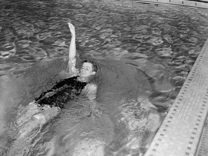 John F. Kennedy swimming for the varsity team at Harvard (1938)