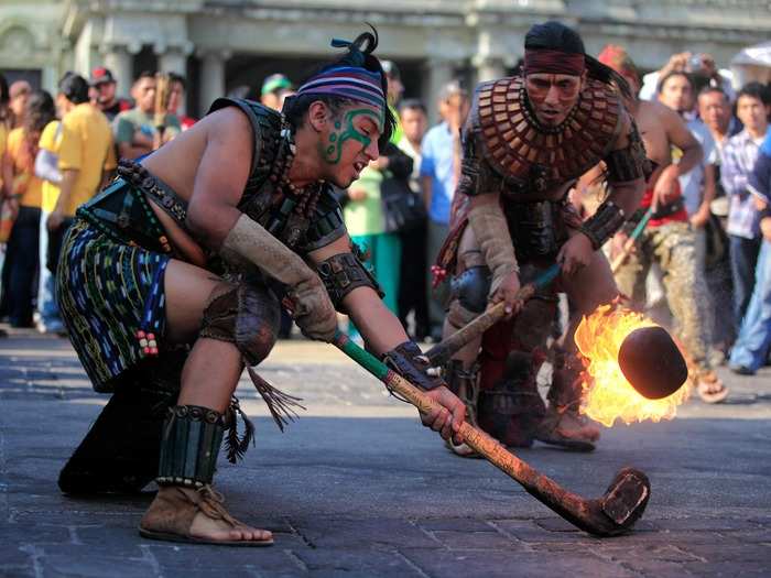 An exhibition game of Maya Ball takes place in Guatemala City, Guatemala. The aim of the ancient game is to hit the ball through a hoop on the side of a wall.