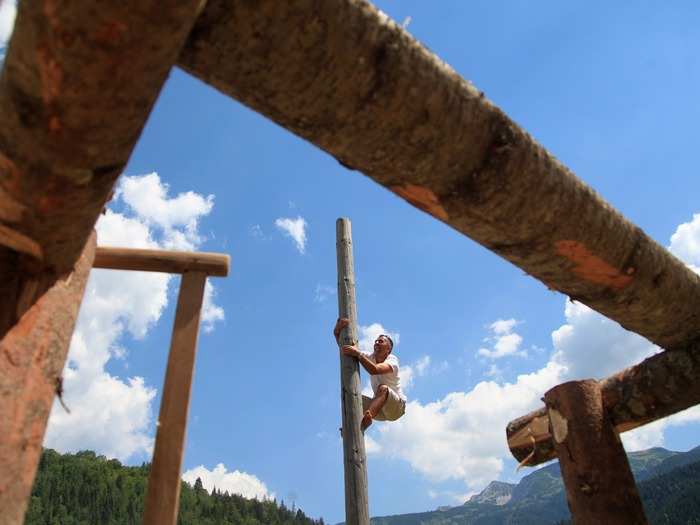 Tree-climbing is a tradition in Kosovo. During the Rugova Traditional Games, held during the first week in August, participants scale a 26-foot-tall pole without any tools whatsoever.