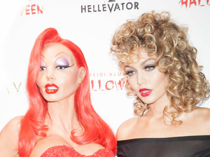 After her performance, Klum posed with model Gigi Hadid, who was dressed as Sandy from "Grease."
