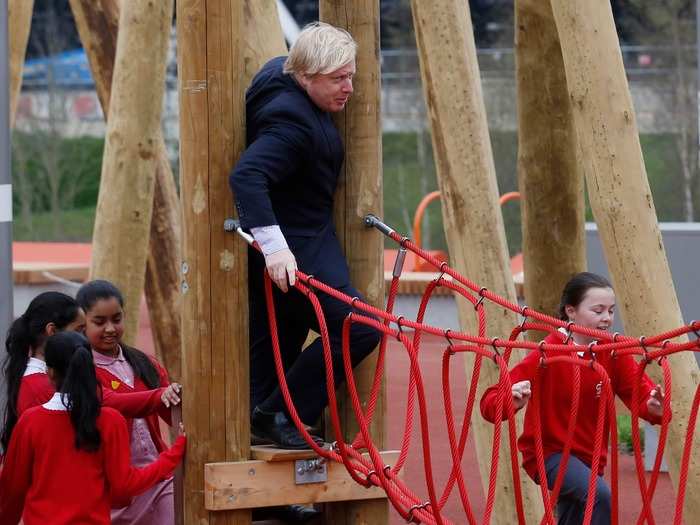 Johnson and Prince Harry paid a visit to the Queen Elizabeth Olympic Park ahead of its opening in Stratford in April 2014. The rope bridge made for a tight squeeze.