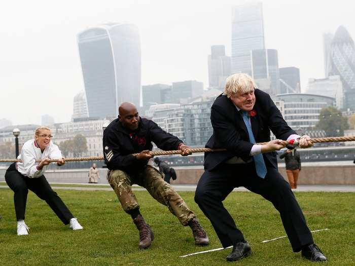 Two weeks later, Johnson competed aggressively in a game of tug-of-war with members of the armed services in honor of London Poppy Day.