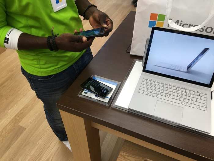 I came to the store to buy the new Surface Book laptop. The Microsoft employee punched my order into his Windows Phone. Within a minute, someone from the stock room came up with my device.