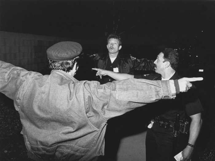 Agent DuWayne Moe gives field-sobriety tests to another driver suspected of a DUI, while Officer Bob Lomeli translates.