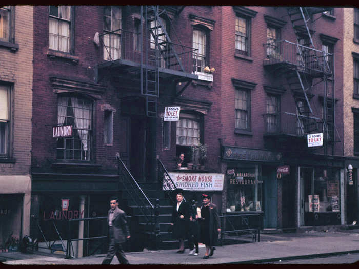 New Yorkers hurry along an undisclosed block between Avenues A and B in 1942.