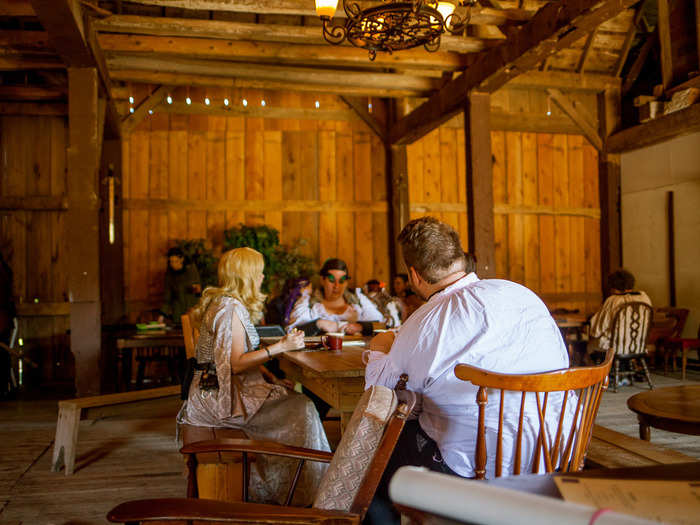 Most of the players were filing into the "tavern," a large room built into the center of the barn. Everyone was waiting in line for eggs, bacon, pancakes, and coffee. Players pay $60 to spend the weekend at Alliance, which covers lodging and meals.