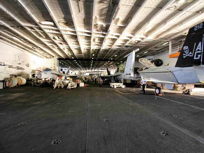 From the flight deck, a single flight of stairs lead into the massive hangar deck.