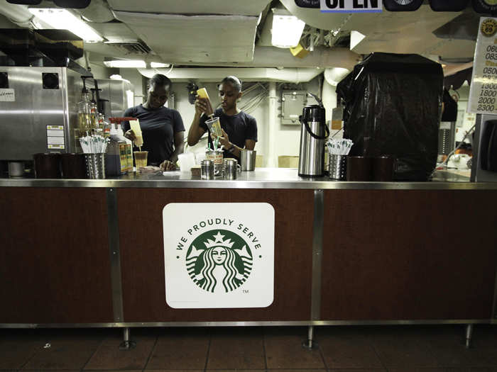 There is even a Starbucks. These sailors trained in a civilian store in the US prior to working here on the ship.