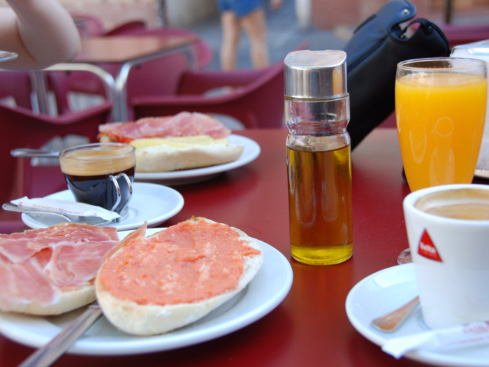 SPAIN: Pan con tomate, or toast with grated tomato spread, is a popular savory breakfast in Spain. For a treat, many restaurants and vendors sell churros.