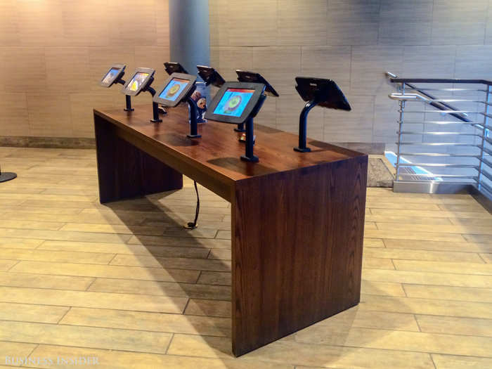 ... these. There are 12 ordering kiosks in this particular store, with plenty of room around them. An inordinate amount of room, in fact. Has this Panera become a panopticon?