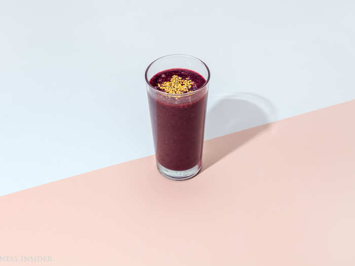 Here we blended a half-glass OJ, two whole beets, a cup of frozen berries, and two stalks of collard greens. The bee pollen topping provides a boost of protein, antioxidants, and color.