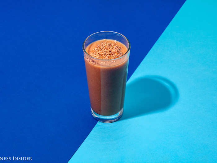 Here we added a half-glass of coconut water, half cup of pumpkin purée, one-and-a-half frozen bananas, a teaspoon of pumpkin pie spice, and five dates into the blender. A few flax seeds tossed on top add fiber and nutty flavor.