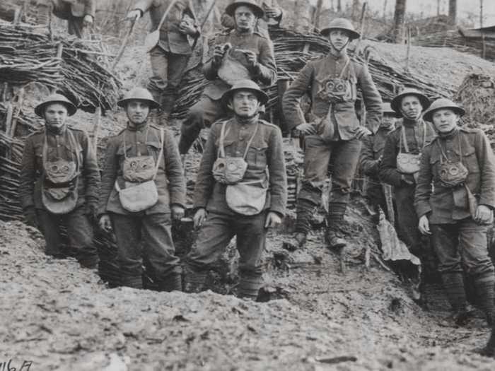 Another picture from 1918 shows Marines in France with gas masks.