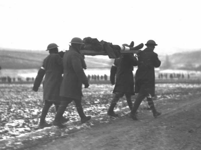 Here, Marines are practicing how to carry a wounded comrade during combat training in western Germany circa 1918. Approximately 2,400 Marines died in World War I.