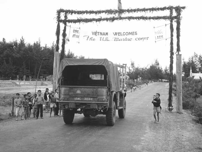 Lasting two decades, the Vietnam War was the next major US conflict. This Marine truck passes under a welcome banner at the entrance of the Vietnamese city Danang back in 1965.