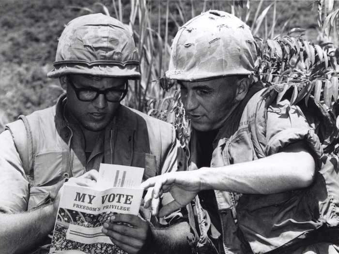 A Marine fills out his voter registration card for the coming 1969 presidential election.