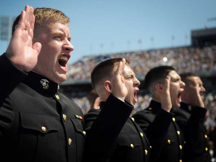 Today more than 205,000 Marines are serving America by air, land, and sea. The Marines pictured here respond "I do" during the oath of office at the US Naval Academy Class of 2012 graduation and commissioning ceremony.