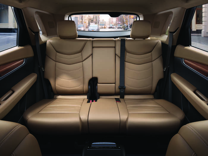 Inside the cabin, the crossover is roomy, with all of the fine leather and rich wood accents one would expect from a Cadillac.