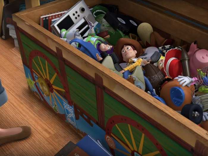 In "Toy Story 3," the toys were kept in a chest that looked like a wagon from the Oregon Trail. It has been around since the first "Toy Story," but teen Andy covered it in stickers.