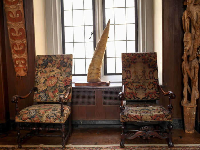 Between these chairs, sits the stuffed penis of a sperm whale that was given to the club in 1977.