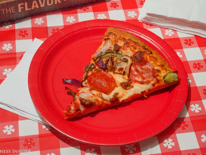 The cheese seems weak in the midst of the mix, and the veggies seemed a little dry on top of the slice – maybe ever so slightly overcooked?