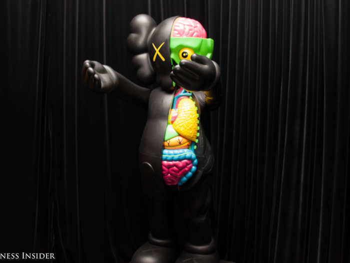 This piece, entitled "Dissected Companion," is also by KAWS.