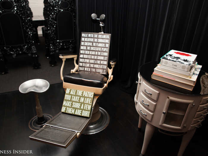 This chair, reminiscent of the motivational signs you might find in a boutique, was gifted to him by a friend.