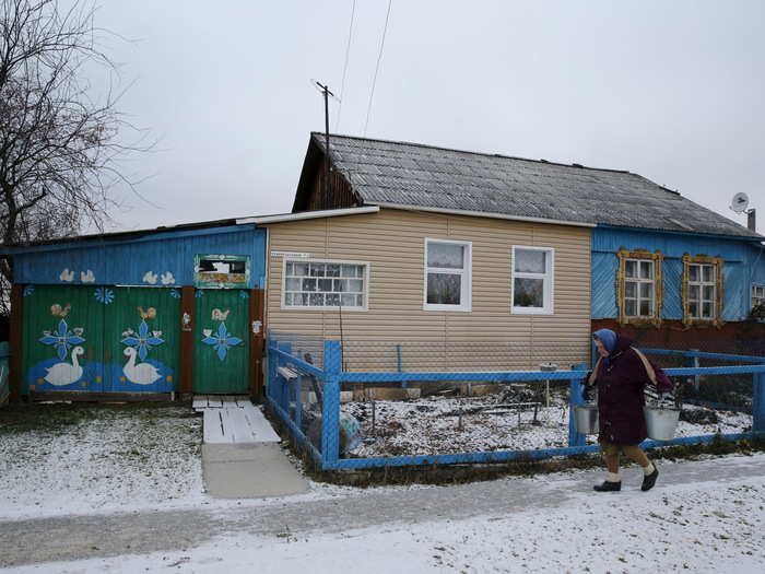 Here in Sankin, water is drawn from wells – no central supply, just buckets.