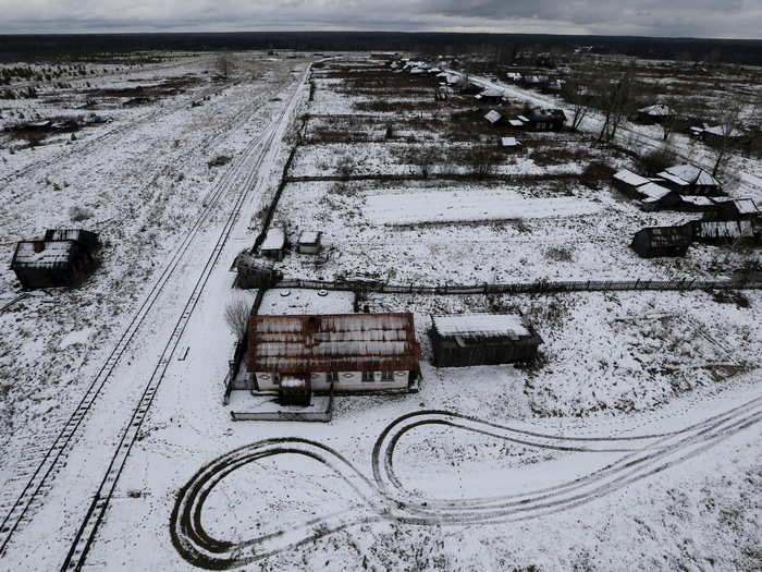 The village of Kalach sits in a scrubby clearing in the middle of the dense forest. In winter, the scene is desolate and harsh.