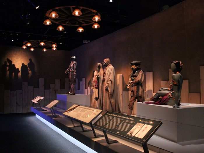 The costumes are laid out across over 10 rooms. They even had themed music: This room, with a touch of western flair from the lighting overhead, played the Cantina music.