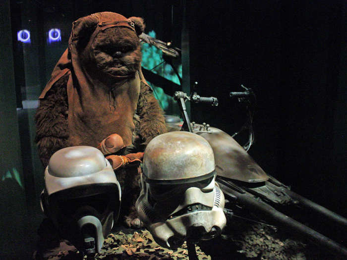 A cleverly placed Ewok hangs out with a few unlucky Stormtroopers.