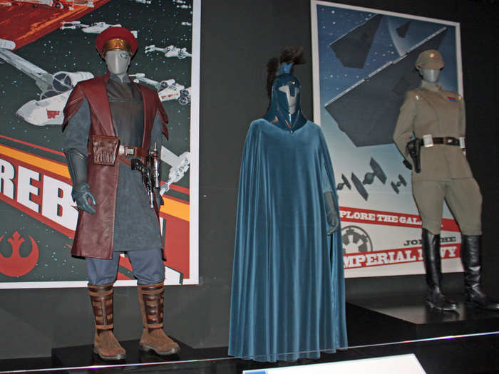 Military suits were inspired by American Navy pilots and World War I and II German soldiers. The helmet on the blue Senate Guard resembles a Trojan war helmet.