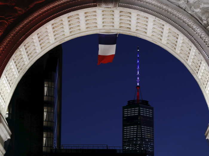 Arch of Washington Square Park (foreground) and One World Trade Center (background) — New York, New York