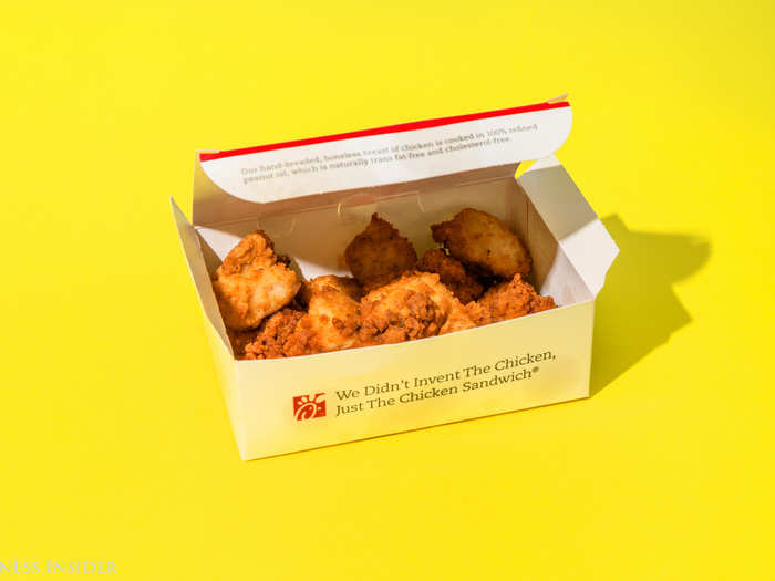 Second up: Chick-Fil-A. On the outside, these golden nuggets are tiny, crispy, bite-sized balls housed in a simple box.