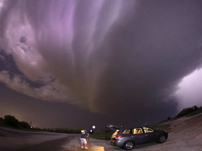 A storm chaser in Texas positions himself under a large thunderstorm supercell, which was charging at speeds of up to 50 miles per hour.