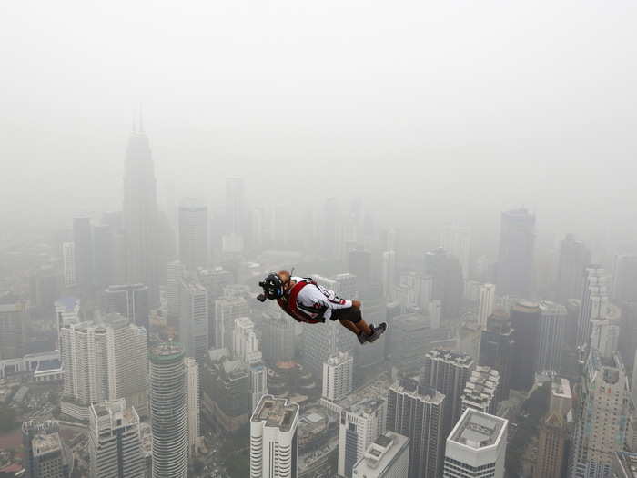 A BASE jumper takes a leap from Malaysia