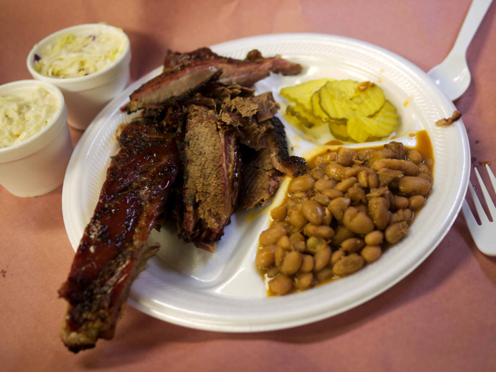 Nosh on the fall-off-the-bone brisket, pork shoulder, steak, and ribs at Texas’ Snow’s BBQ — a favorite BBQ spot of chef Bobby Flay.