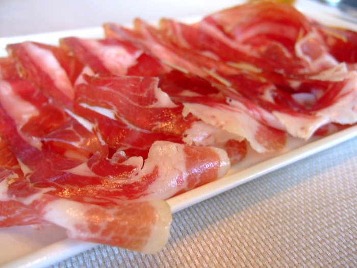 Treat yourself to a plate of jamón ibérico in Spain. Savor it on its own or on a slice of toast.