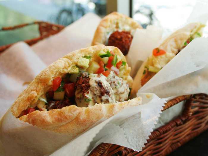 Take a bite out of a crispy, fresh falafel sandwich overstuffed with vegetables in Amman, Jordan. Al Quds and Abu Staif are some of the most famous falafel shops.