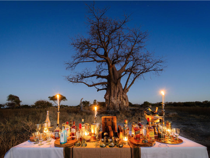 Eat breakfast while watching zebras at the Little Mombo Camp in Botswana