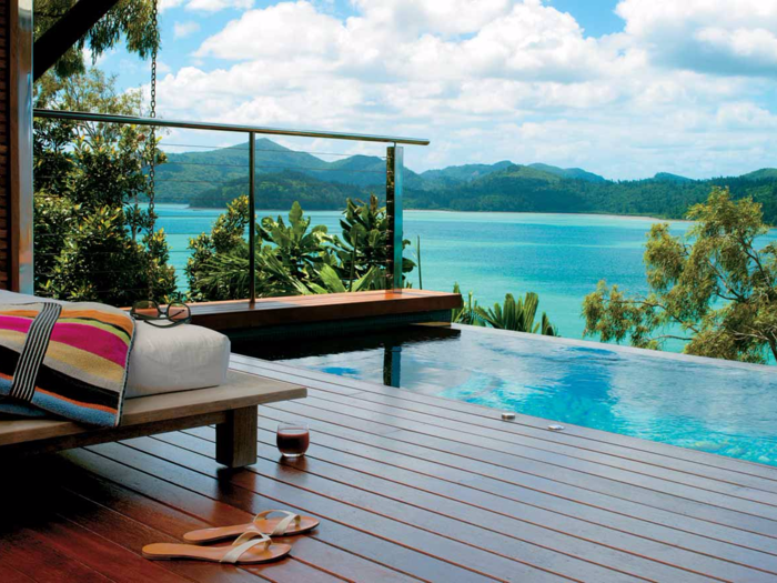 Soak in a private infinity-edge pool while overlooking the Great Barrier Reef at Qualia, a hotel on Australia