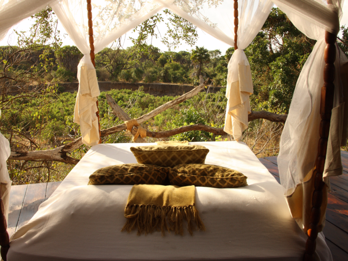 Enjoy stunning views and eat communal meals with safari guides at Beho Beho in Tanzania.