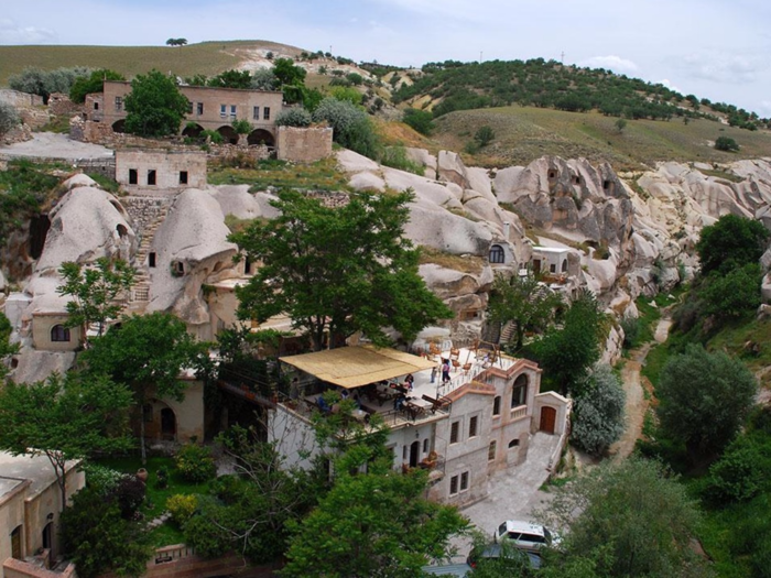 Nestle into a cave suite at the Gamirasu Cave Resort, which is carved into the rocks of Cappadocia, Turkey.