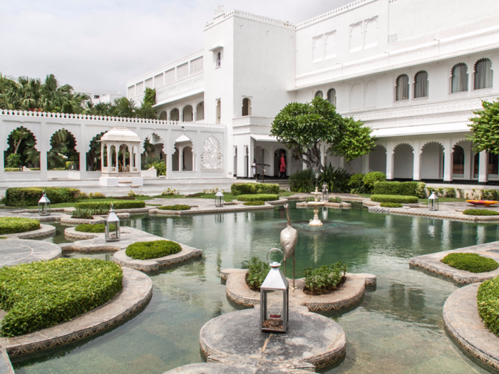 Get pampered at the Taj Lake Palace, which sits in the middle of Lake Pichola in Udaipur, India, and is known for its world-class service.