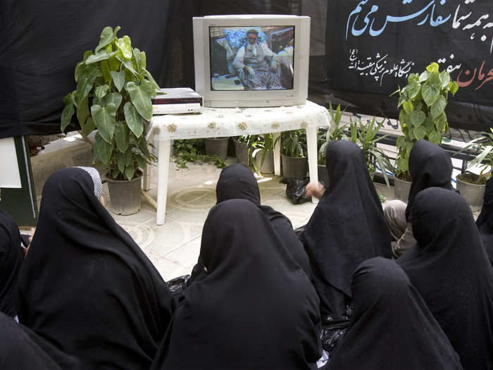 In Tehran, the capital of Iran, women attend a ceremony to mark the death of the late Islamic Republic founder Ayatollah Ruhollah Khomeini.