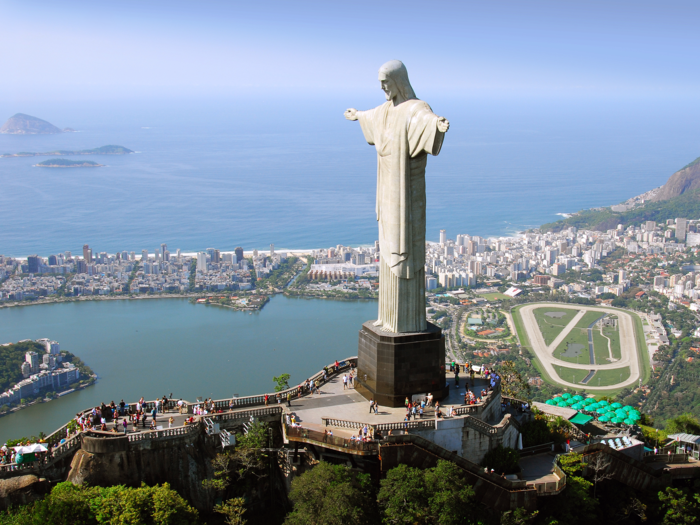 Gaze at the Christ the Redeemer statue, which rises more than 2,000 feet above Rio de Janeiro, Brazil. The statue’s awe-inspiring scale and design led to its being recognized as one of the seven new wonders of the world.