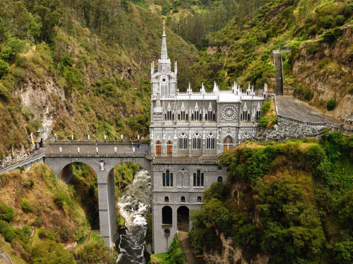 Admire the stunning neo-Gothic architecture of Las Lajas Sanctuary, which crosses a gorge on the border between Colombia and Ecuador. Marvel at its stunning landscape, set 150 feet above the river in between lush cliffs and waterfalls, before seeing its stunning interiors.